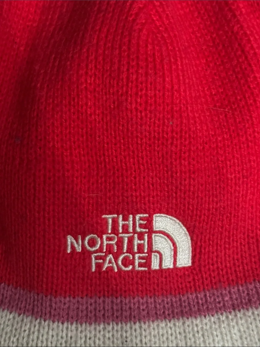 The North Face Girl’s Red Beanie with Trim!
